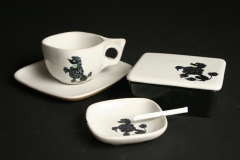 Glidden Pottery Chi Chi poodle ashtray, 1951-1955,  with candy cigarette
