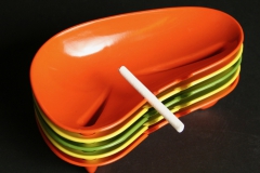 Styled by Kaye LaMoyne melamine ashtrays with candy cigarette