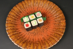 2018.94 Stangl Pottery Americana in Variegated Rust pattern with sushi